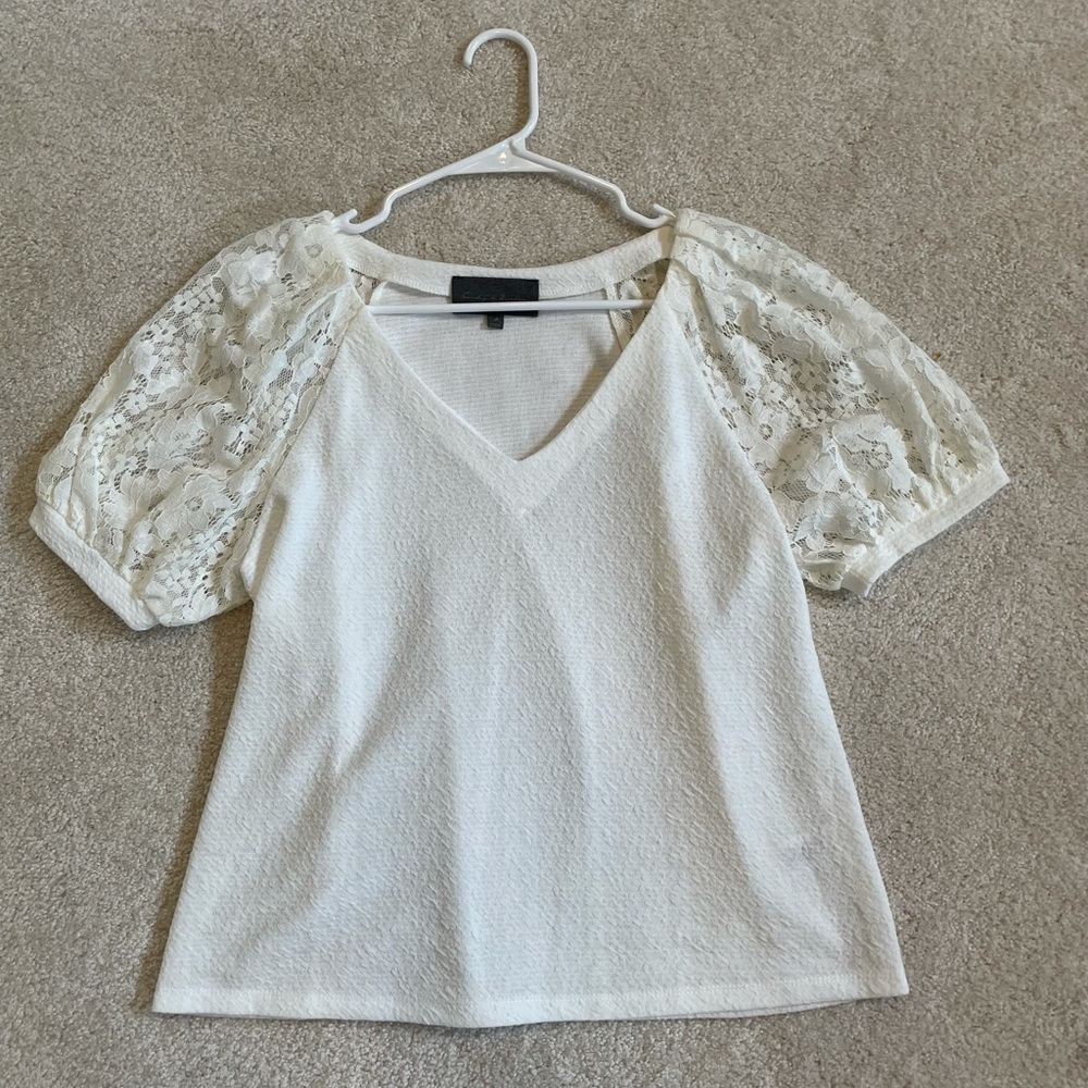 Anthropologie white top with lace puff sleeves